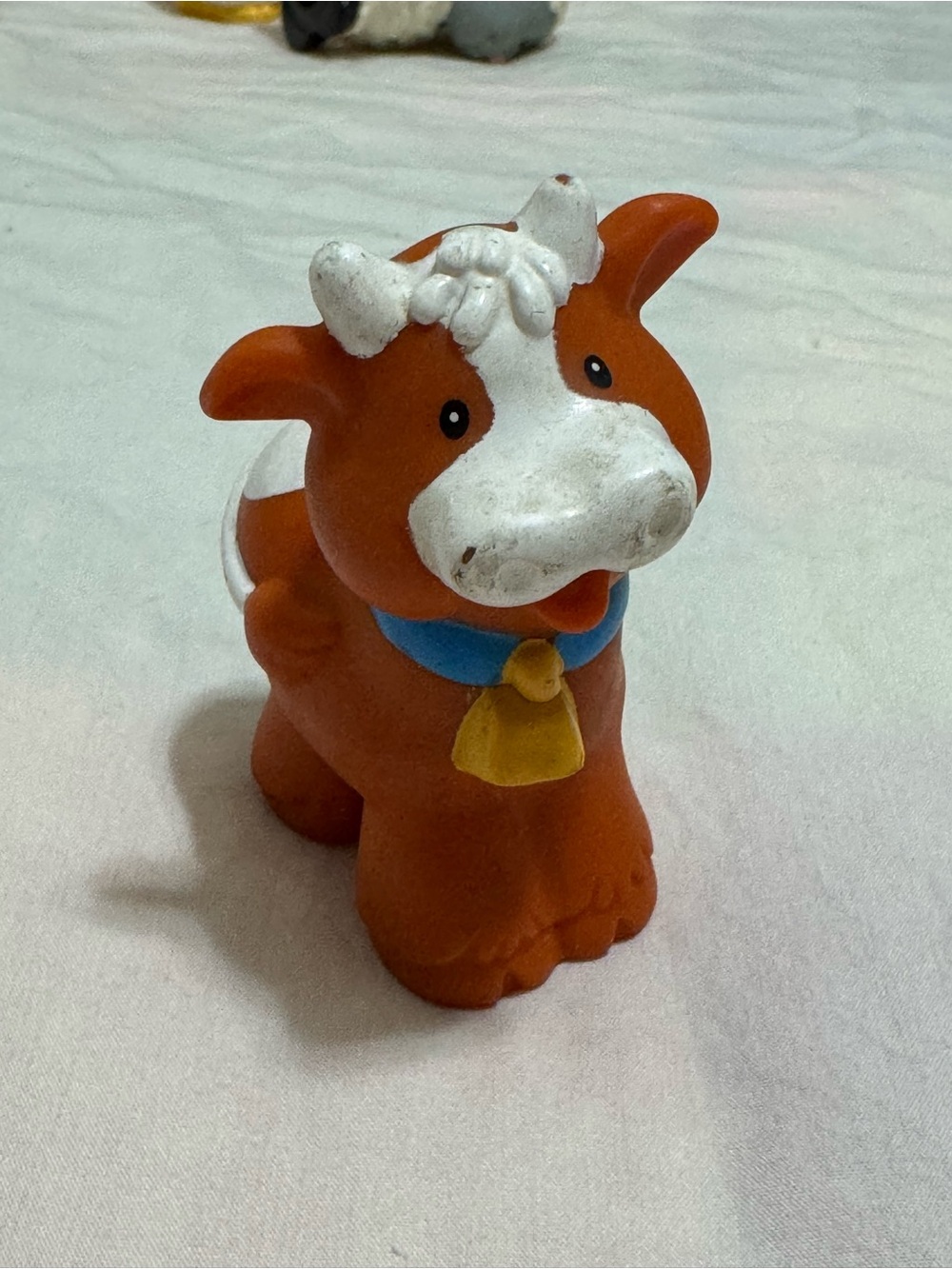Little People Brown and White Cow with Blue Collar and Yellow Bell